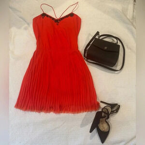 Victoria’s Secret red dress with black bejeweled embellishments